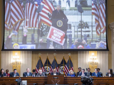 An image of former President Donald Trump is displayed as members of the House Select Committee to Investigate the January 6 Attack on the U.S. Capitol hold its last public meeting on December 19, 2022, in Washington, D.C.
