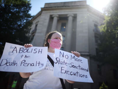 Anti death penalty activist protests in front of U.S. Justice Department