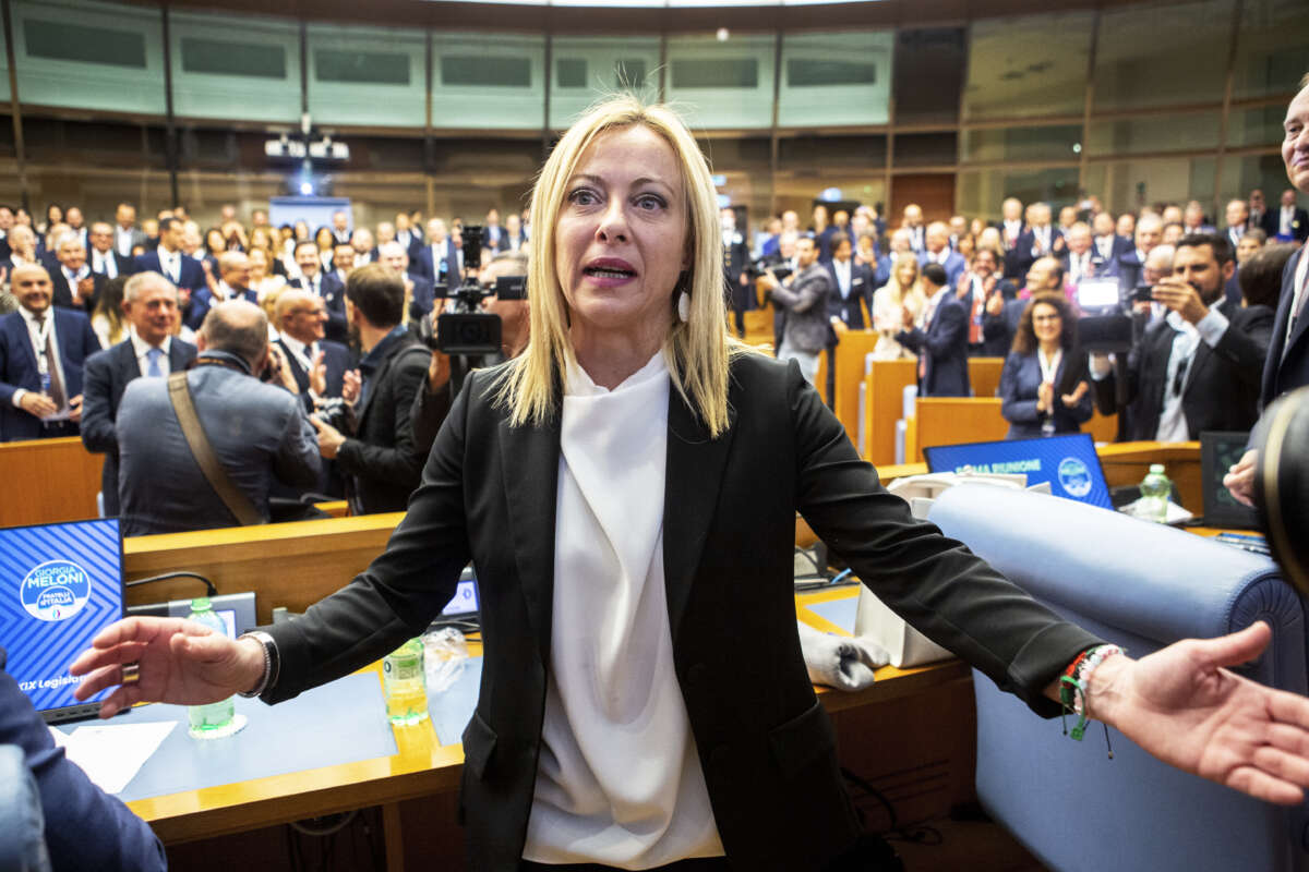 Giorgia Meloni, leader of the Brothers of Italy party and winner of the Italian election, poses for photographers during a meeting with newly elected deputies and senators of her party, on October 10, 2022 in Rome, Italy.