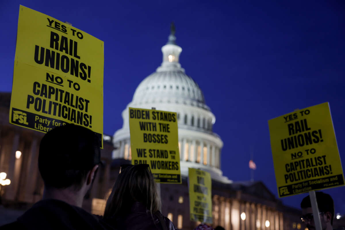 Activists in support of unionized rail workers protest outside the U.S. Capitol Building on November 29, 2022 in Washington, DC.