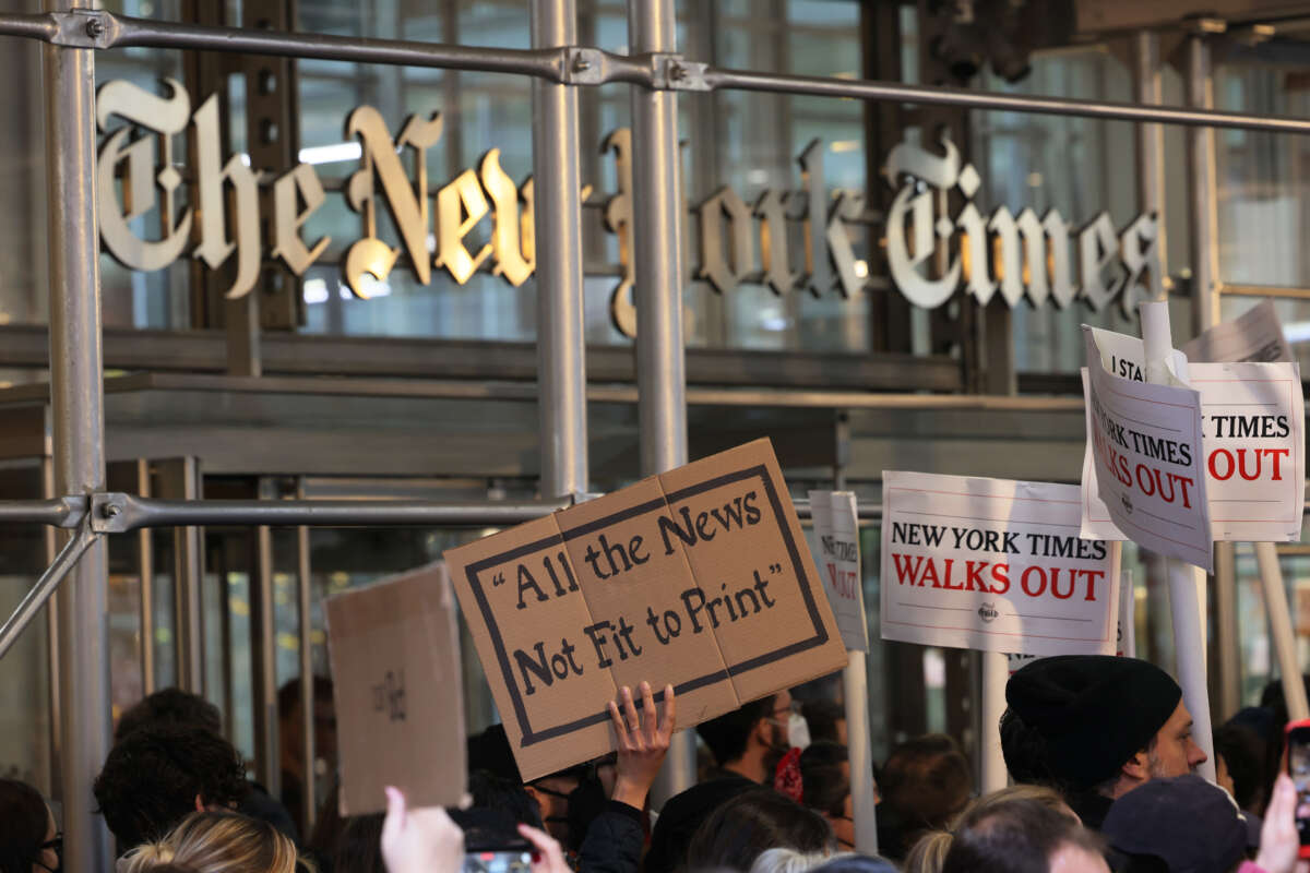 Members of the New York Times staff hold a rally outside of the New York Times headquarters as they participate in a strike on December 8, 2022 in New York City.