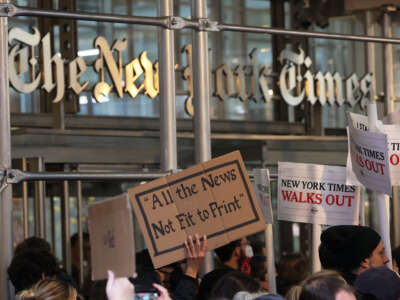 Members of the New York Times staff hold a rally outside of the New York Times headquarters as they participate in a strike on December 8, 2022 in New York City.