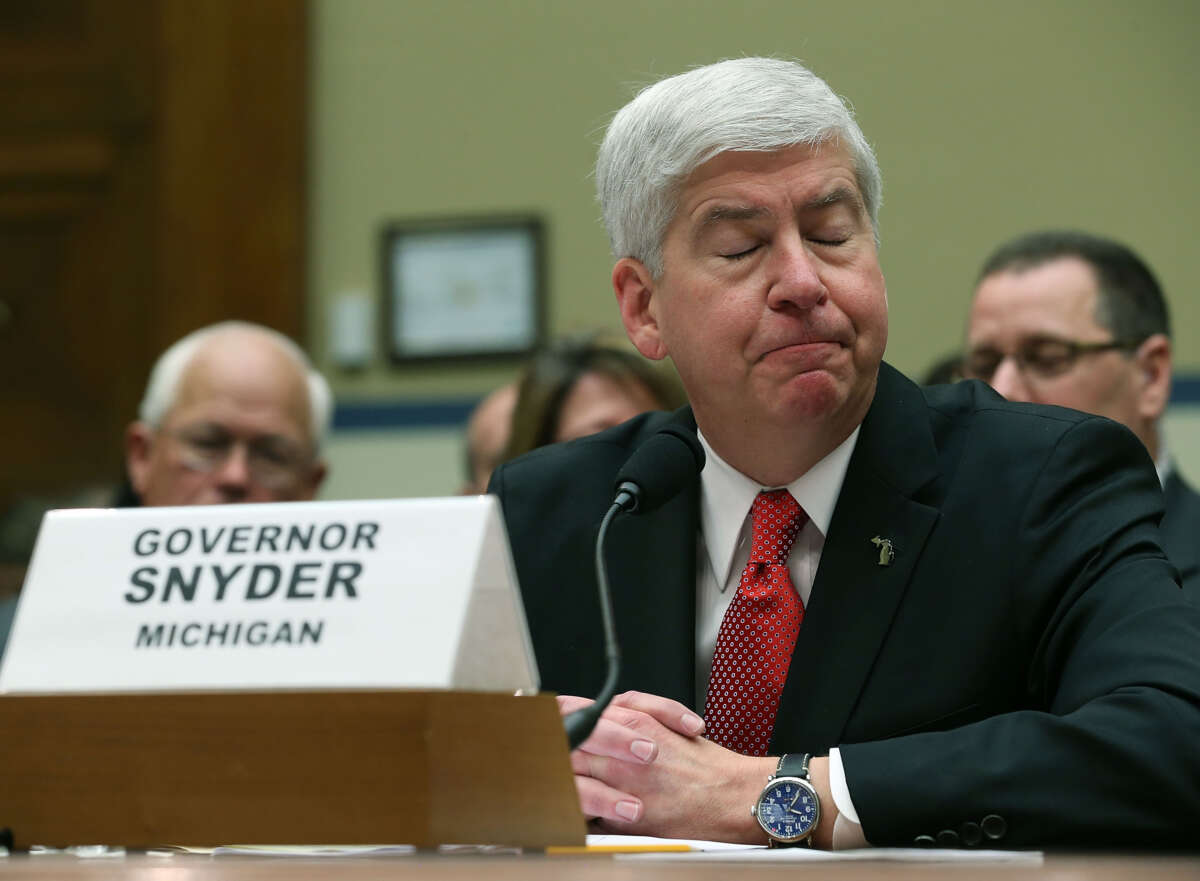 Gov. Rick Snyder listens to members comments during a House Oversight and Government Reform Committee hearing about the Flint, Michigan water crisis on March 17, 2016, in Washington, D.C.