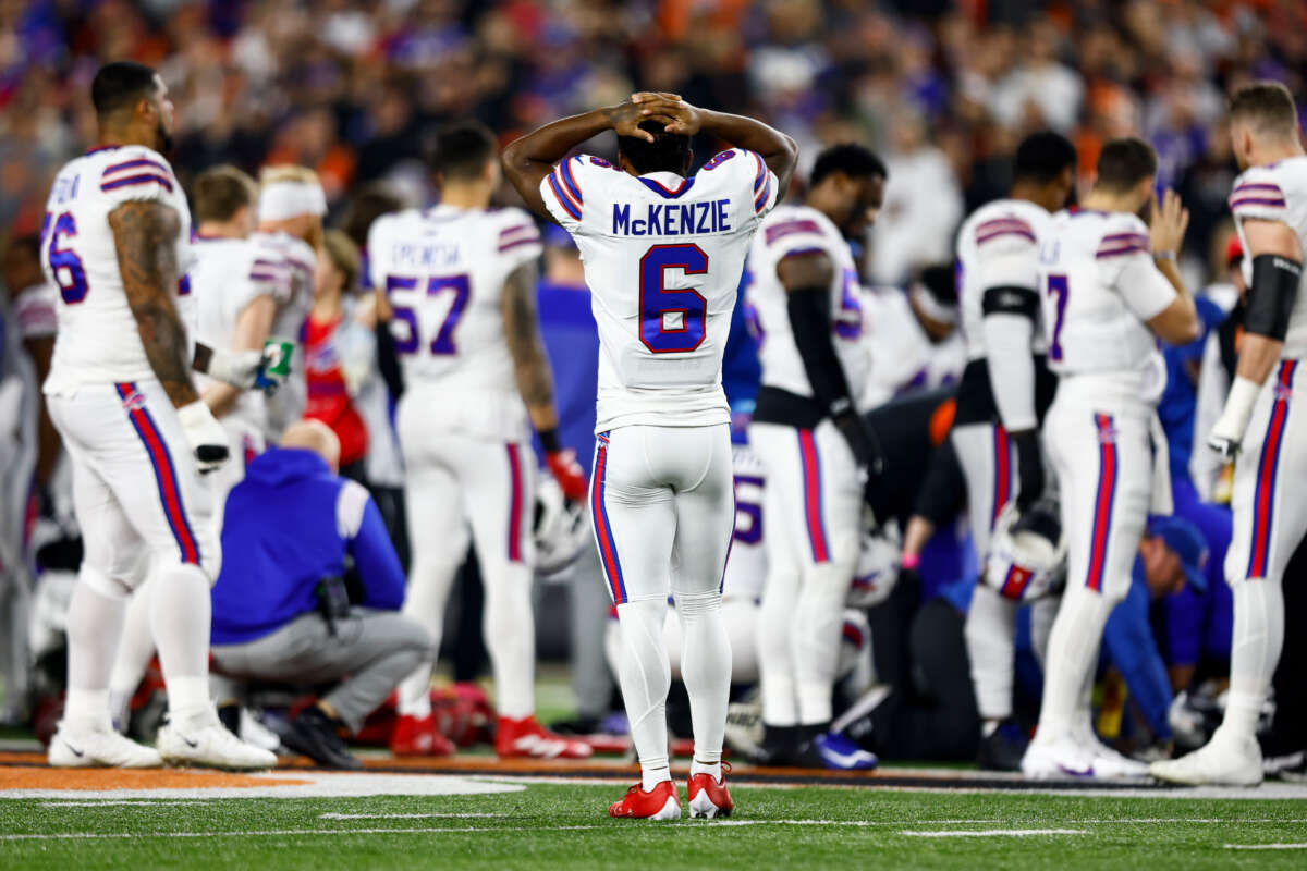 Buffalo Bills players react to an injury sustained by Damar Hamlin during the first quarter of an NFL football game against the Cincinnati Bengals at Paycor Stadium on January 2, 2023, in Cincinnati, Ohio.