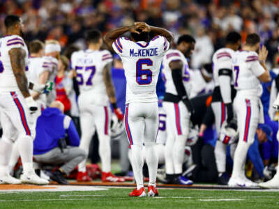 Buffalo Bills players react to an injury sustained by Damar Hamlin during the first quarter of an NFL football game against the Cincinnati Bengals at Paycor Stadium on January 2, 2023, in Cincinnati, Ohio.