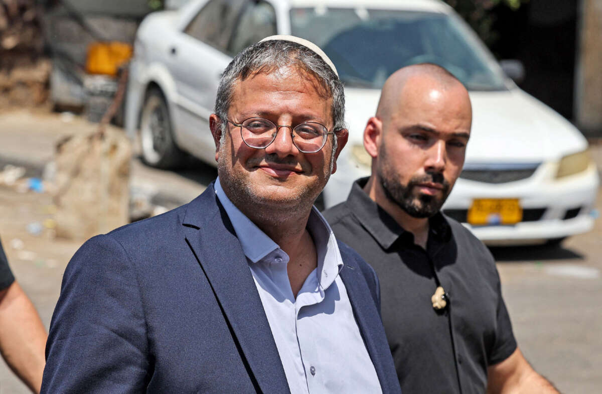 Itamar Ben-Gvir, left, Israeli far right lawmaker and leader of the Otzma Yehudit (Jewish power) party, arrives with other Israeli right-wing activists at the archaeological and religious site of the Tomb of Samuel at the Nabi Samuel village between Ramallah and Jerusalem in the occupied West Bank on September 2, 2022.