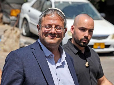 Itamar Ben-Gvir, left, Israeli far right lawmaker and leader of the Otzma Yehudit (Jewish power) party, arrives with other Israeli right-wing activists at the archaeological and religious site of the Tomb of Samuel at the Nabi Samuel village between Ramallah and Jerusalem in the occupied West Bank on September 2, 2022.