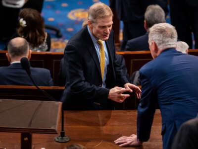 Rep. Jim Jordan speaks with Rep. Kevin McCarthy after he fell short of 218 votes to become speaker after the first ballot gestures, on January 3, 2023, in Washington, D.C.