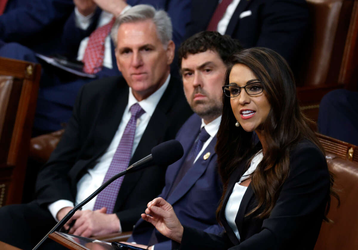 Rep.-elect Lauren Boebert, right, delivers remarks alongside House Republican Leader Kevin McCarthy, left, in the House Chamber during the second day of elections for Speaker of the House at the U.S. Capitol Building on January 4, 2023, in Washington, D.C.