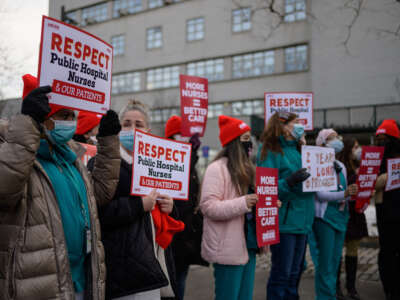 Nurses of the New York State Nurses Association attend a press conference on January 13, 2022, in New York City.