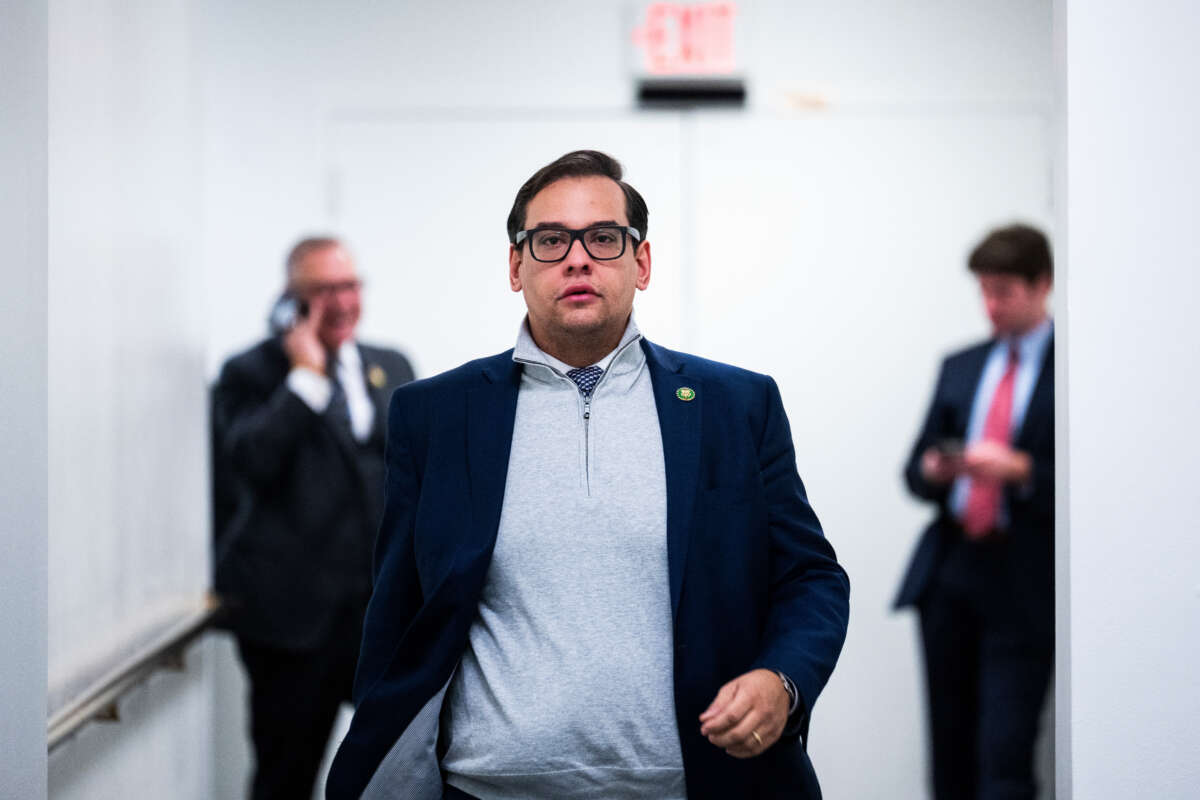 Rep. George Santos is seen outside a House Republican Conference meeting in the U.S. Capitol on January 10, 2023.