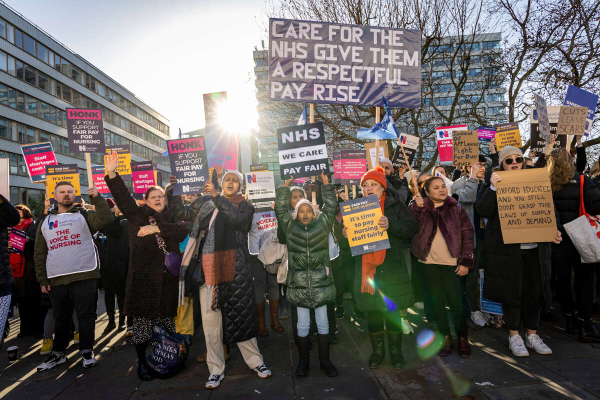 Nurses and supporters strike on a picket line outside St. Thomas' Hospital on December 20, 2022, in London, United Kingdom.