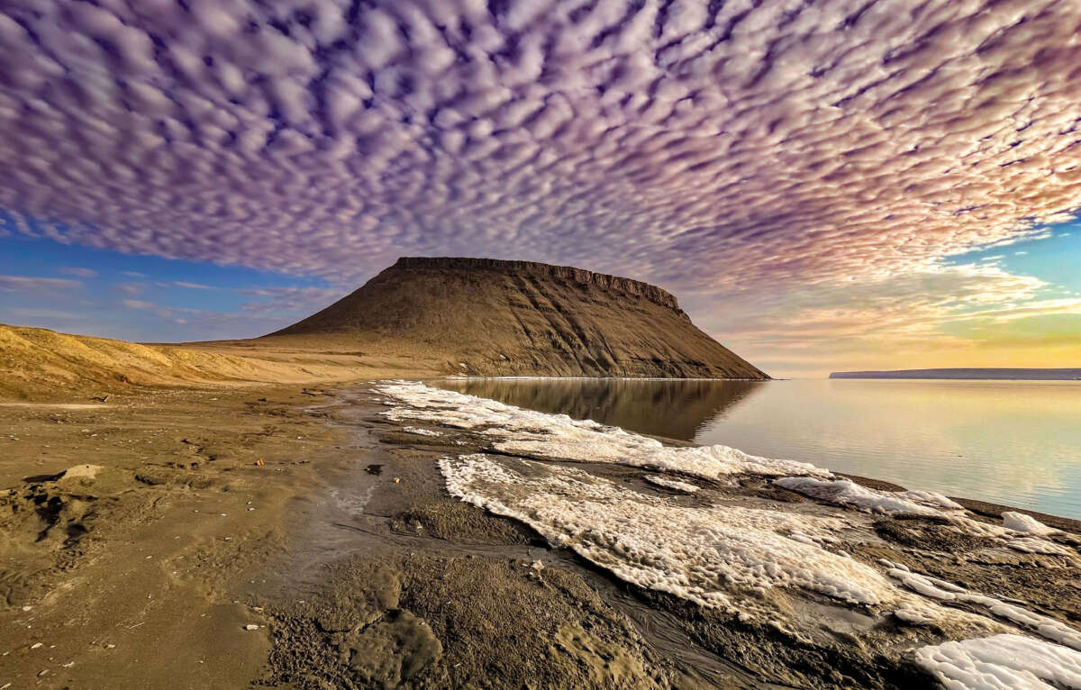 Dundas Hill on the hottest day of the year, at 65 degrees Fahrenheit, on July 15, 2022, as seen from the ground during a NASA mission along with University of texas scientists to measure melting Arctic sea ice.