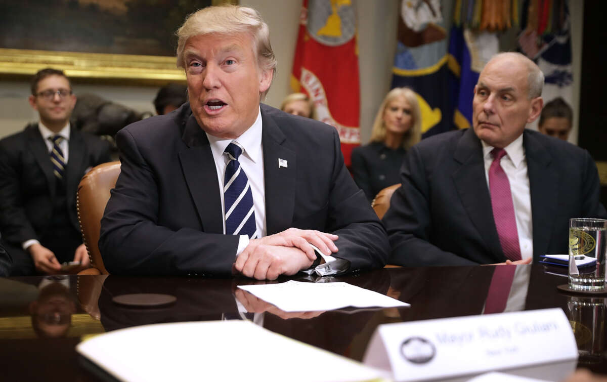 Then-President Donald Trump delivers remarks at the beginning of a meeting with then-Homeland Security Secretary John Kelly and other government cyber security experts in the Roosevelt Room at the White House on January 31, 2017, in Washington, D.C.