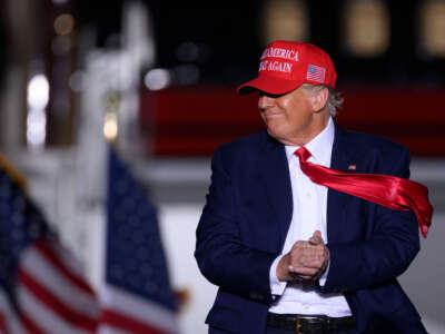 Former President Donald Trump arrives for a rally ahead of the midterm elections at Arnold Palmer Regional Airport in Latrobe, Pennsylvania, on November 5, 2022.