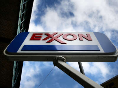 A sign for an Exxon gas station stands in a Brooklyn neighborhood on October 28, 2016, in New York City.