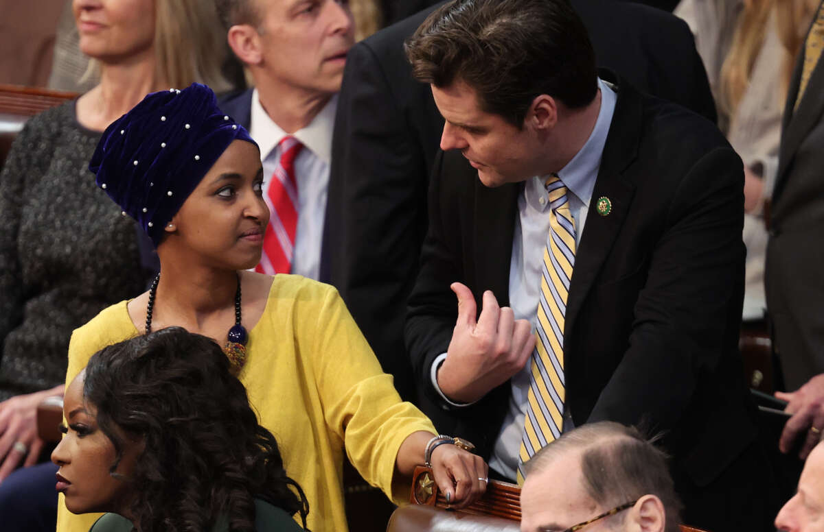 Rep.-elect Matt Gaetz, right, talks to Rep.-elect Ilhan Omar in the House Chamber during the third day of elections for Speaker of the House at the U.S. Capitol Building on January 5, 2023, in Washington, D.C.