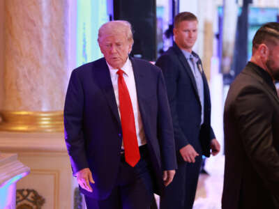 Former President Donald Trump arrives to speak with the media during an election night event at Mar-a-Lago on November 8, 2022, in Palm Beach, Florida.
