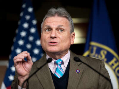 Rep. Buddy Carter speaks from a podium during the House Republican news conference at the Capitol.