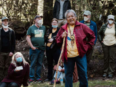 Pricilla Hunter speaks to the community on behalf of Coyote Valley Band of Pomo Indians. The Coyote Valley Band of Pomo Indians along with their inter-tribal relatives are calling for an immediate halt to all logging and extractive industry in the forest, and are working with environmental NGOs to build a visionary forest management plan based on traditional ecological land management and access for cultural healing and regeneration.