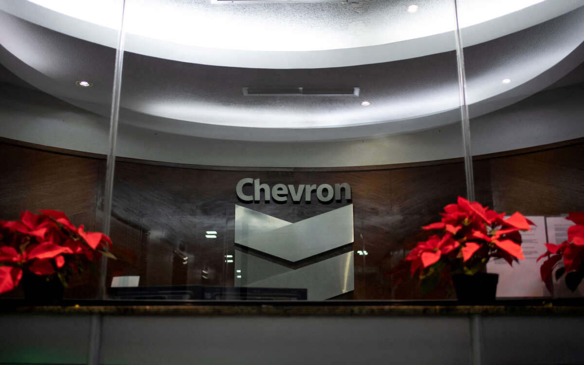 A Chevron Global Technology Services Company logo is seen at an administrative office in Caracas on November 29, 2022.