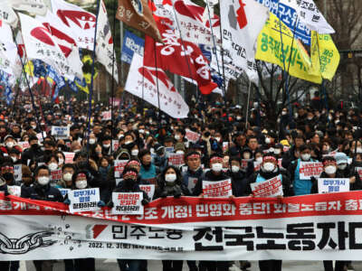 Labour union members from the Korean Confederation of Trade Unions participate in a rally in front of national assembly on December 3, 2022, in Seoul, South Korea.