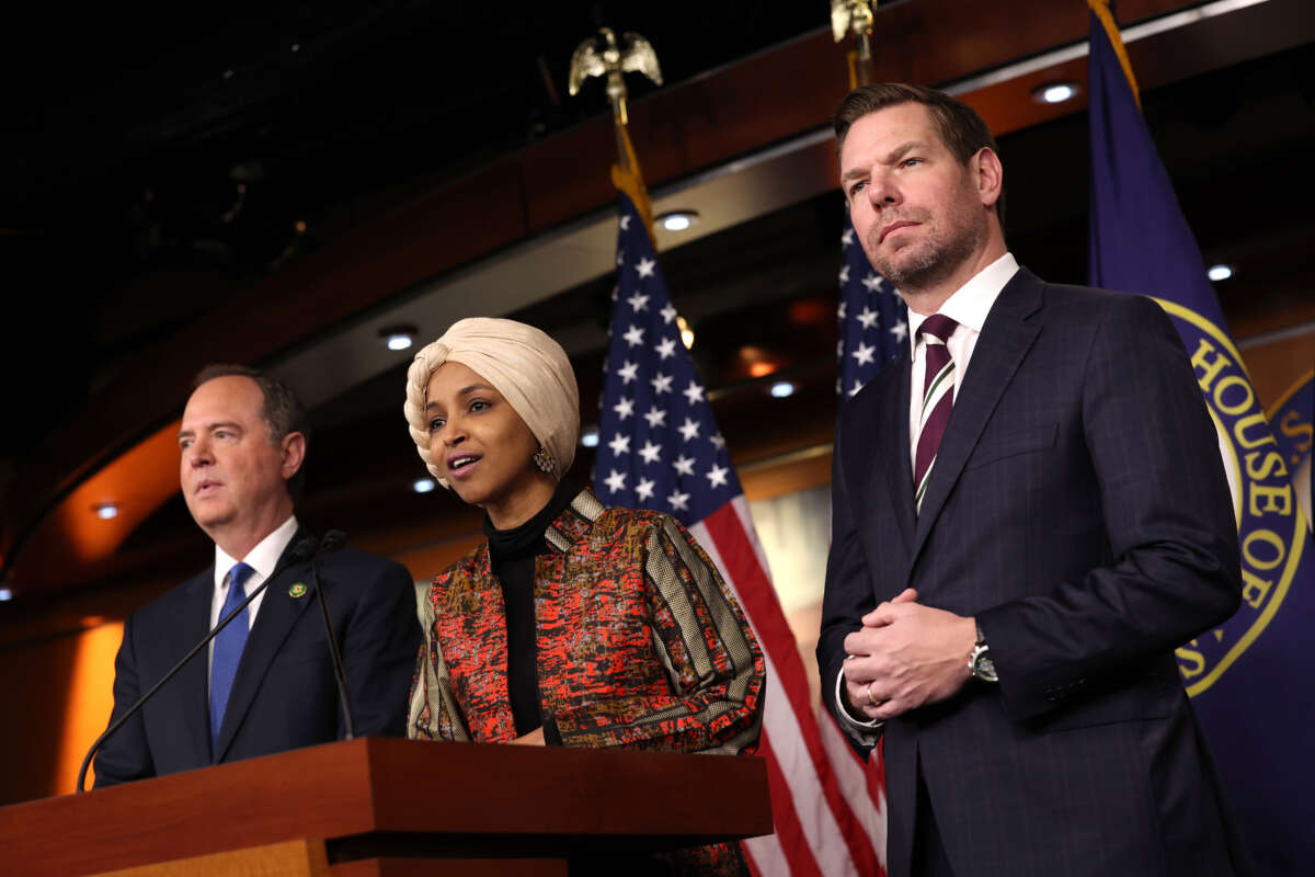 Rep. Ilhan Omar, center, joined by Reps. Eric Swalwell, right, and Adam Schiff, speaks at a press conference on committee assignments for the 118th U.S. Congress, at the U.S. Capitol Building on January 25, 2023, in Washington, D.C.