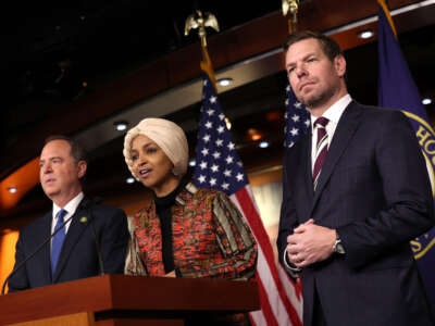 Rep. Ilhan Omar, center, joined by Reps. Eric Swalwell, right, and Adam Schiff, speaks at a press conference on committee assignments for the 118th U.S. Congress, at the U.S. Capitol Building on January 25, 2023, in Washington, D.C.