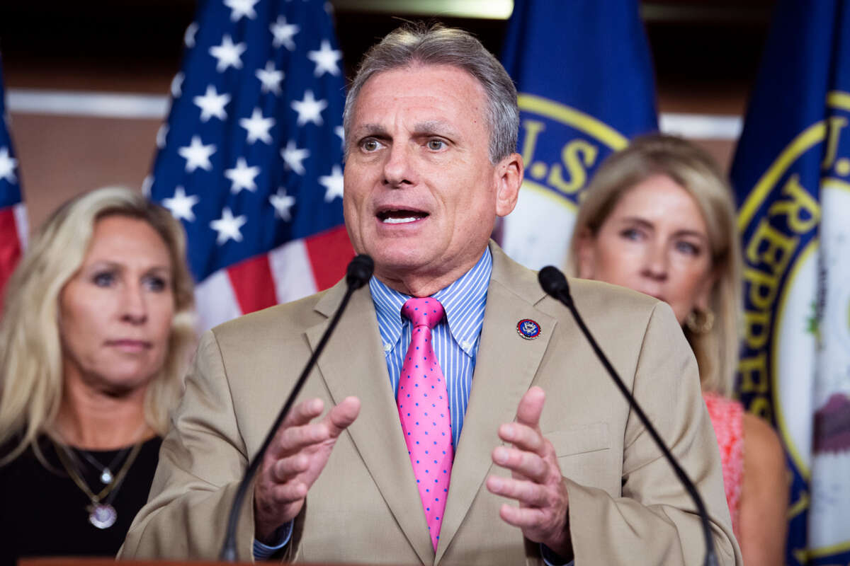 Rep. Buddy Carter speaks into a microphone