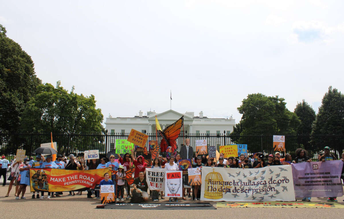 Protesters demonstrate in front of the White House calling on Biden to end the ICE contract with Berks County.