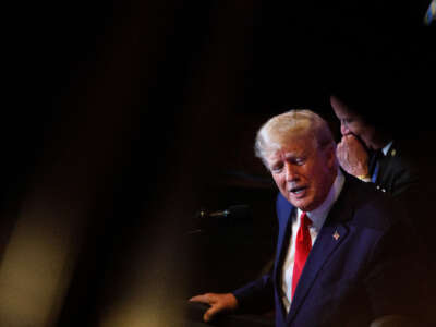 Former President Donald Trump addresses the crowd during a 2024 election campaign event in Columbia, South Carolina, on January 28, 2023.