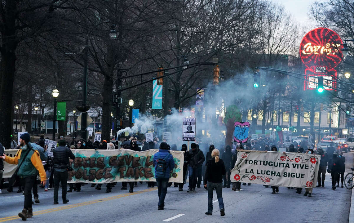 Demonstrators protest the death of forest defender Manuel Tortuguita Paez Teran on January 21, 2023, in Atlanta, Georgia.