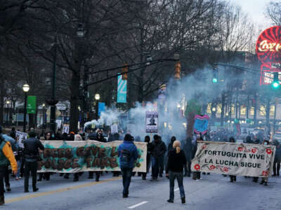 Demonstrators protest the death of forest defender Manuel Tortuguita Paez Teran on January 21, 2023, in Atlanta, Georgia.