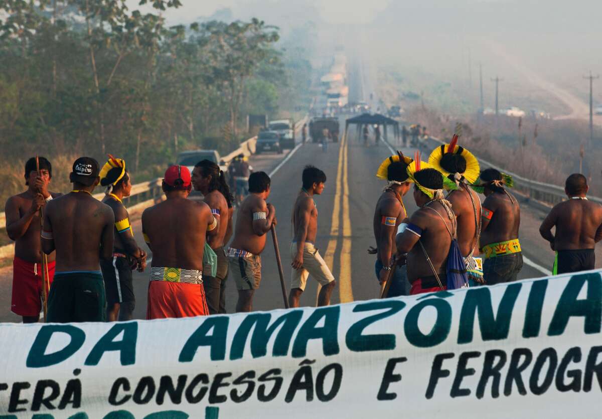 Members of the Kayapo tribe block highway BR163 during a protest against illegal deforestation and insufficient support during the COVID-19 pandemic on the outskirts of Novo Progresso in Pará, Brazil, on August 17, 2020.