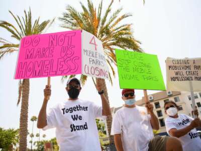 Residents facing looming displacement protest a lack of affordable housing outside of Carson City Hall in Carson, California on July 15, 2021.