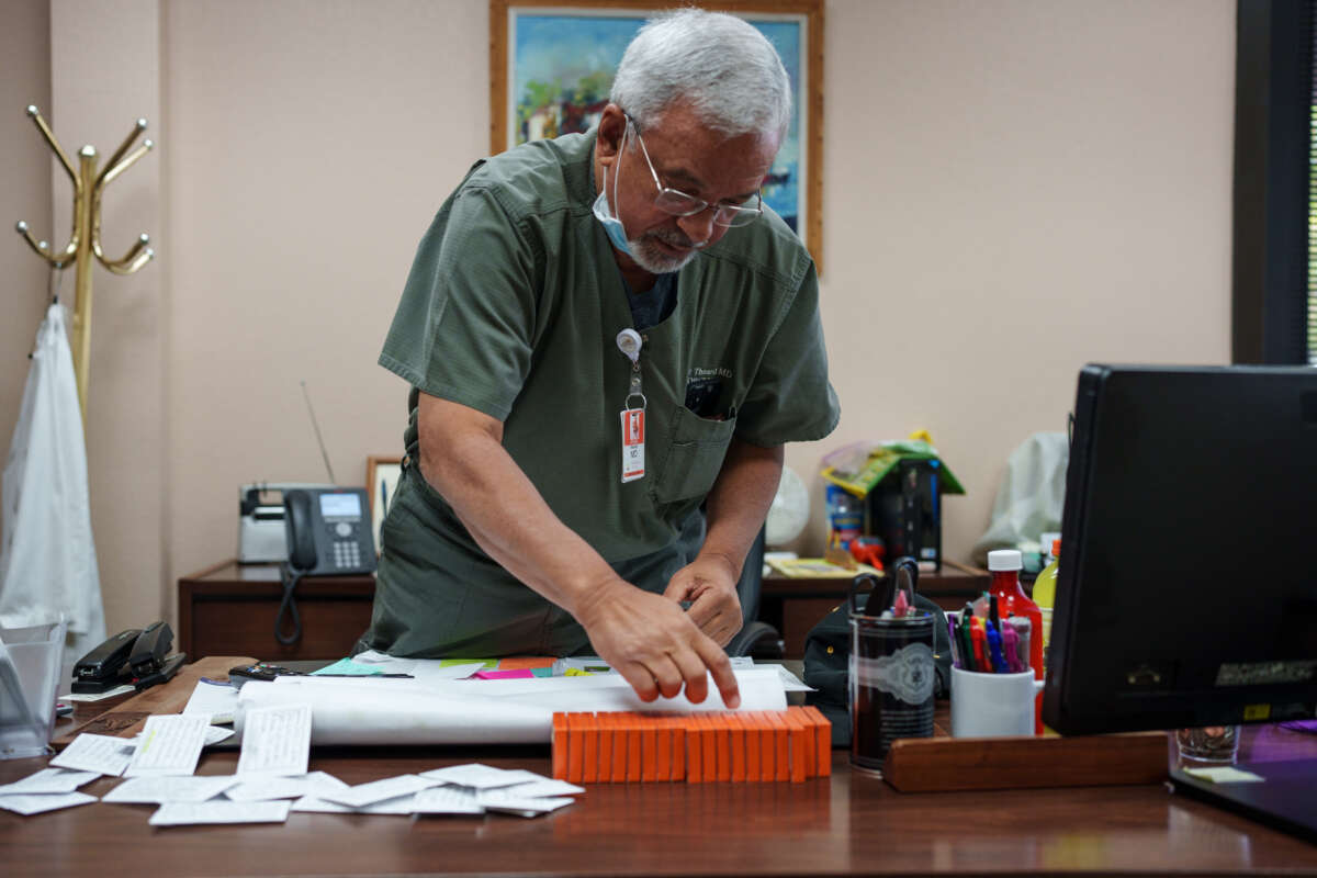 Dr. Franz Theard prepares doses of Mifepristone, the abortion pill, in his clinic in Santa Teresa, New Mexico on May 7, 2022.
