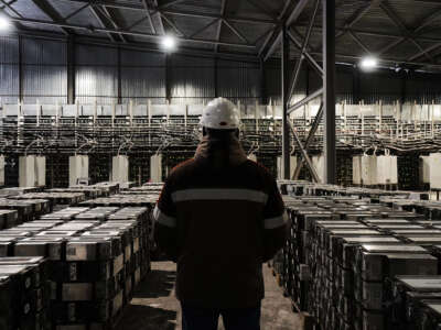 A staff member works at one of the largest Bitcoin mines in the world in Ekibastuz, Kazakhstan on January 3, 2023.
