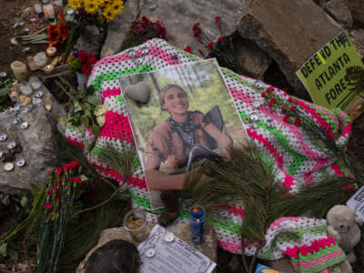 A photo of Manuel "Tortuguita" Terán, who was shot and killed by a Georgia state trooper, is seen on a makeshift memorial in Weelaunee People's park on January 21, 2022 in Atlanta, Georgia.