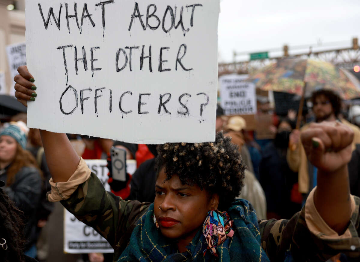 Demonstrators protest the killing of Tyre Nichols on January 28, 2023 in Memphis, Tennessee.