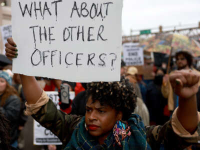 Demonstrators protest the killing of Tyre Nichols on January 28, 2023 in Memphis, Tennessee.