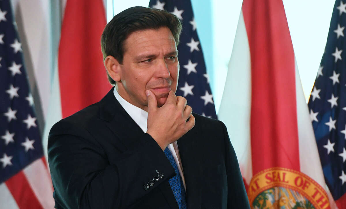 Florida Gov. Ron DeSantis gestures during a press conference to announce the Moving Florida Forward initiative at the SunTrax Test Facility in Auburndale, Florida, on January 30, 2023.
