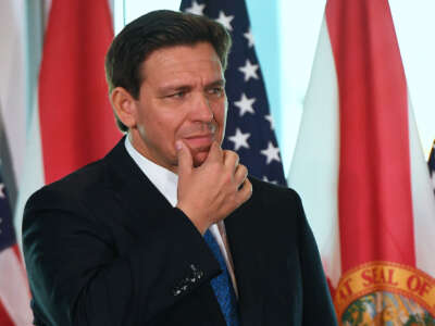 Florida Gov. Ron DeSantis gestures during a press conference to announce the Moving Florida Forward initiative at the SunTrax Test Facility in Auburndale, Florida, on January 30, 2023.