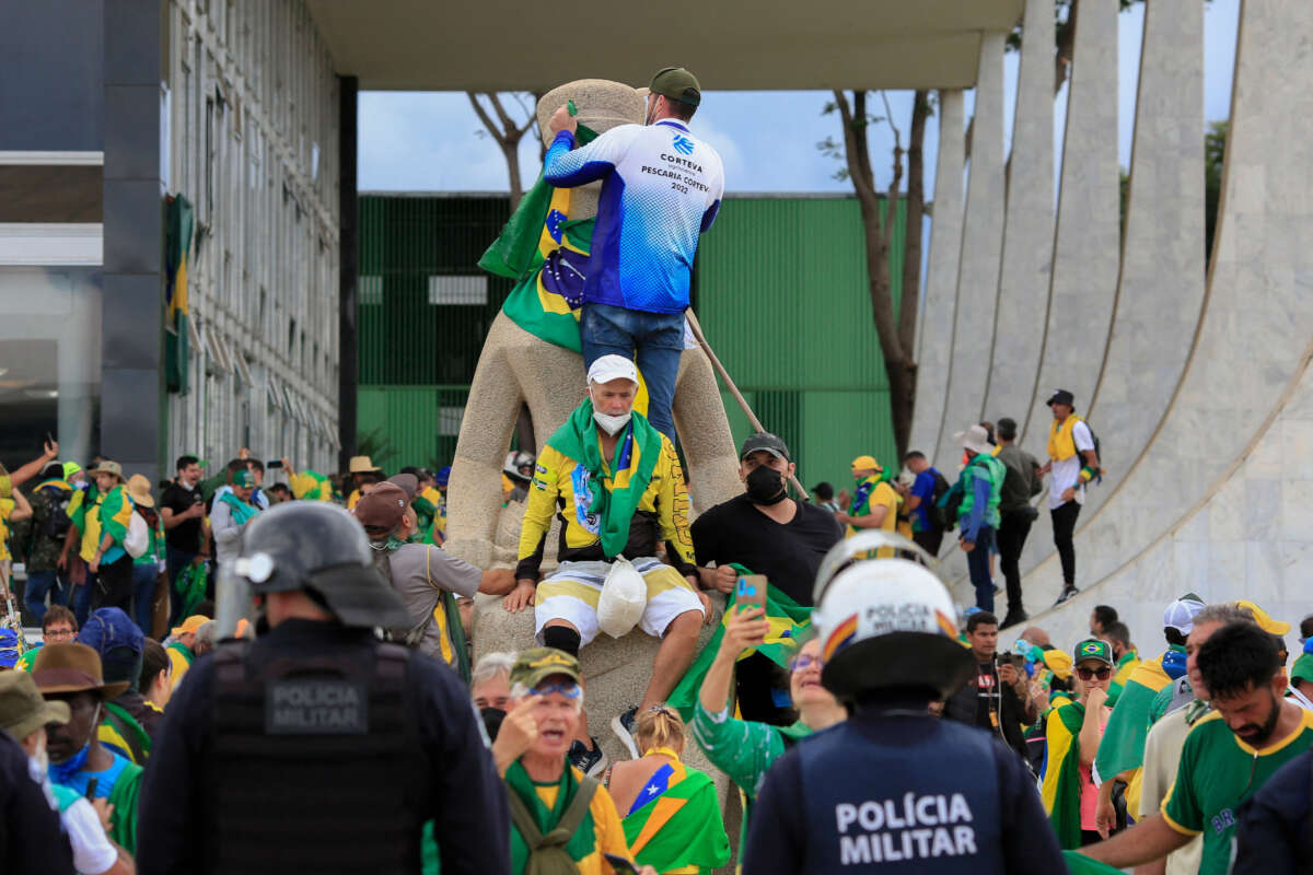 Supporters of Brazilian former President Jair Bolsonaro invade Planalto Presidential Palace in Brasília on January 8, 2023.