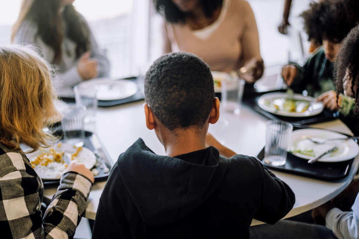 Kids eat lunch at school cafeteria