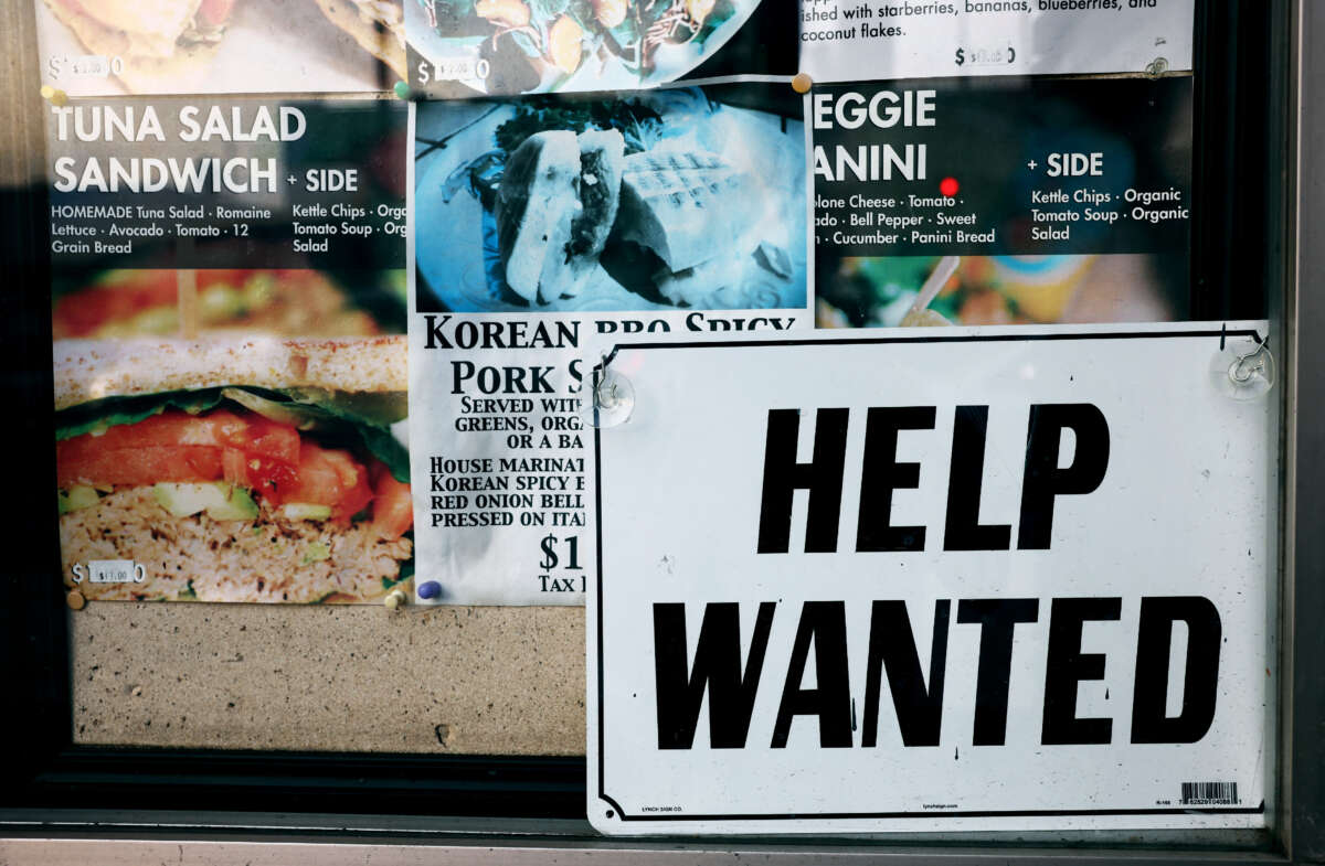 A Help Wanted sign is posted at a restaurant amid a still-robust labor market on February 2, 2023, in Los Angeles, California.