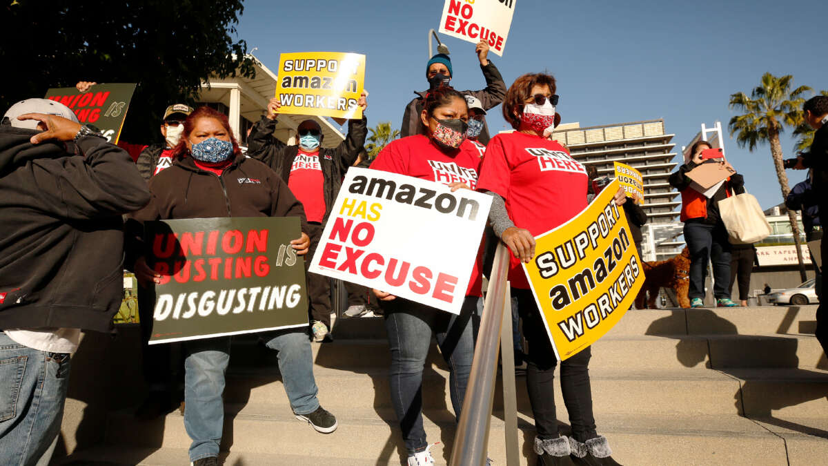 Union workers rally in downtown Los Angeles in support of unionizing Amazon workers in Alabama, on March 22, 2021, in Los Angeles, California.