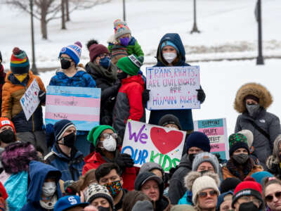 People rally in support of transgender rights in St. Paul, Minnesota, on March 6, 2022.