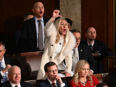 Rep. Marjorie Taylor Greene and Republican members of Congress react as President Joe Biden delivers the State of the Union address in the House Chamber of the U.S. Capitol in Washington, D.C., on February 7, 2023.