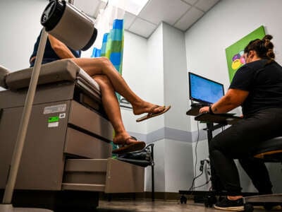 A woman talks to a doctor at a Planned Parenthood clinic in West Palm Beach, Florida, on July 14, 2022.