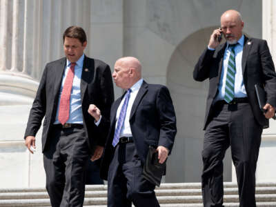 From left, Representatives Jodey Arrington, Kevin Brady, and Chip Roy walk down the House steps on May 20, 2021.